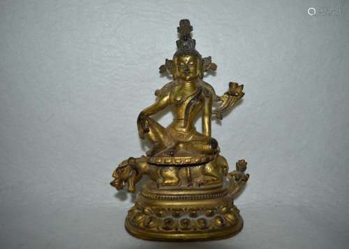 A GILT BRONZE BUDDHA FIGURE PENDANT