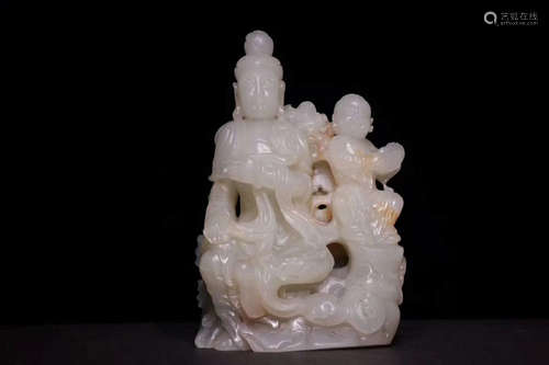 A HETIAN JADE GUAN YIN FIGURE