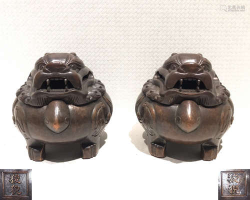 PAIR OF BRONZE FIGURES OF SUANNI MARK