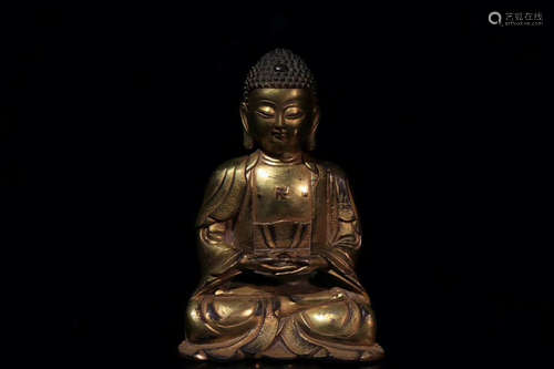 A GILT-BRONZE FIGURE OF BUDDHA