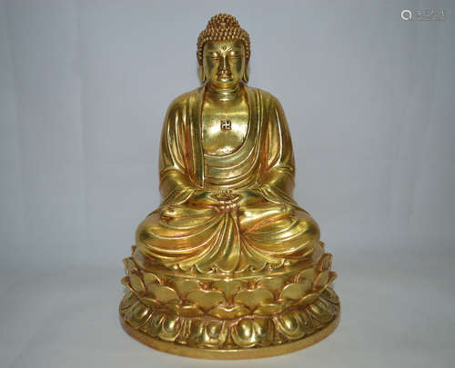 A GILT BRONZE FIGURE OF BUDDHA