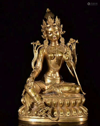 A GILT-BRONZE FIGURE OF BUDDHA