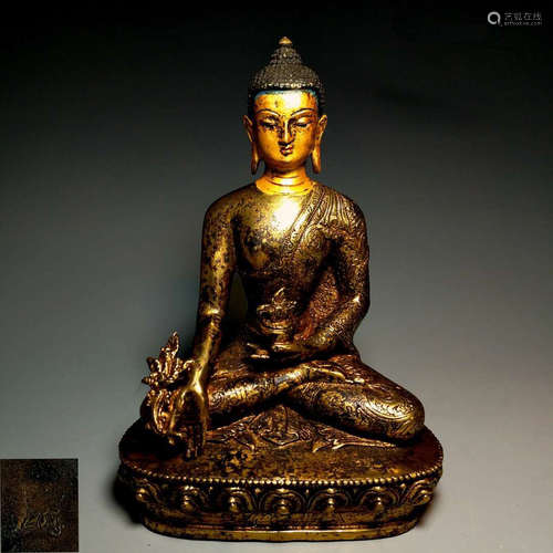 A GILT BRONZE FIGURE OF BUDDHA