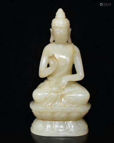 A HETIAN JADE CARVED FIGURE OF BUDDHA