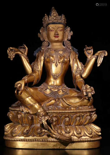 A GLIT-BRONZE FIGURE OF BUDDHA