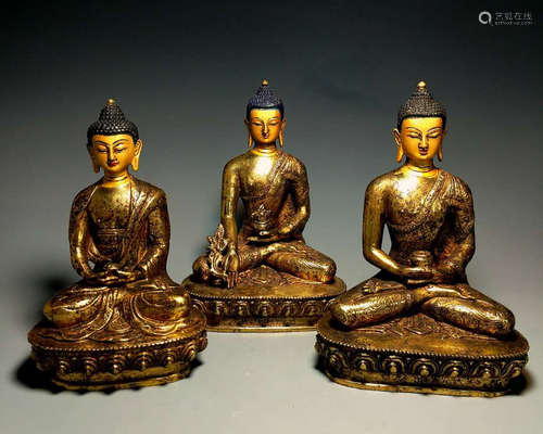 THREE GILT BRONZE FIGURES OF BUDDHA