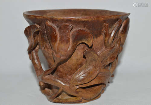 A WOODEN CARVING OF JUE CUP