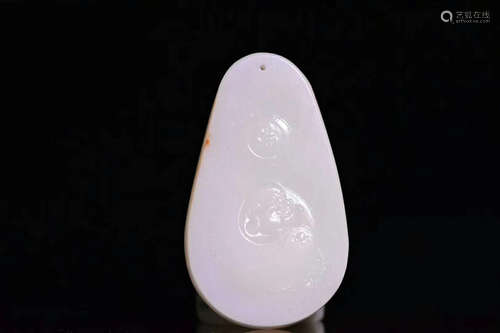 A HETIAN JADE BUDDHA PENDANT