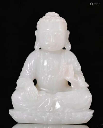 A HETIAN JADE BUDDHA FIGURE