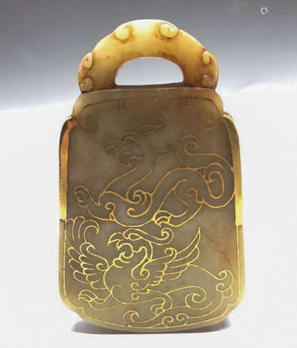 A GILT JADE STONE SCULPTE