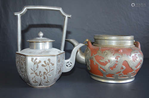 Two Chinese tea pots.