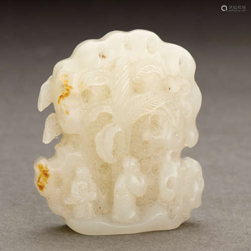 A CHINESE WHITE JADE IMMORTAL PENDANT