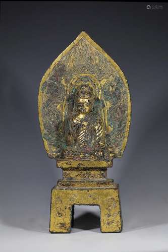 A GILT-BRONZE SEATED FIGURE OF BUDDHA NORTHERN WEI DYNASTY