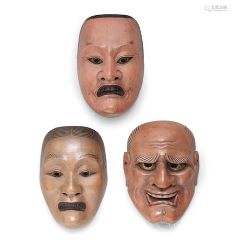 One attributed to Hanyu Mitsunaga, Taisho (1912-1926) or Showa (1926-1989) era, 20th century A Noh mask and two Kagura masks