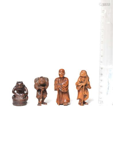 Edo period (1615-1868), 19th century Four wood figure netsuke