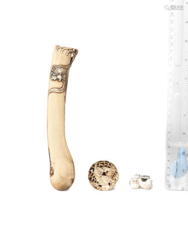 Edo period (1615-1868), 19th century A stag antler pipecase, manju and ivory netsuke of toys