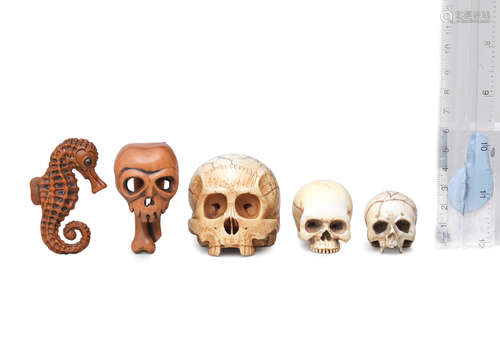 Edo period (1615-1868) or Meiji era (1868-1912), 19th to early 20th century Two wood netsuke and three ivory skulls