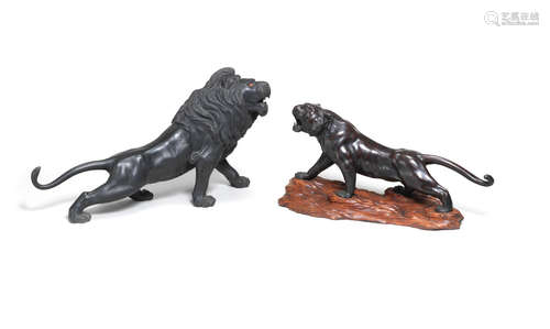 The lion by Kiyomitsu and the tiger by Watanabe, Meiji era (1868-1912), late 19th/early 20th century One bronze lion and one bronze tiger