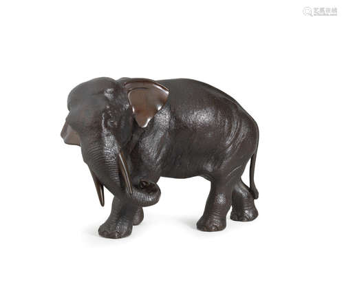 By Genryusai Seiya, Meiji era (1868-1912), late 19th/early 20th century A bronze okimono of an elephant