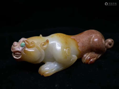 A HAN DYNASTY JADE AUSPICIOUS ANIMAL ORNAMENT