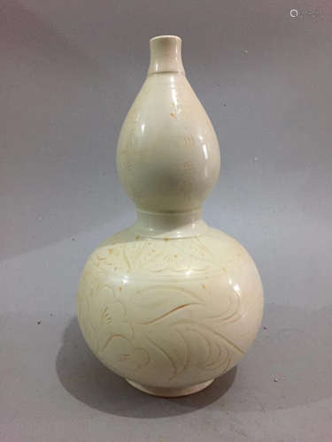 A DING KILN GOURD VASE