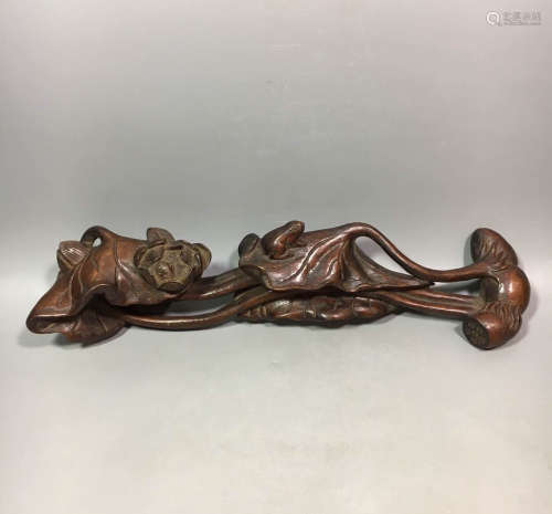A QING DYNASTY EAGLEWOOD LOUTS SHAPED RUYI ORNAMENT