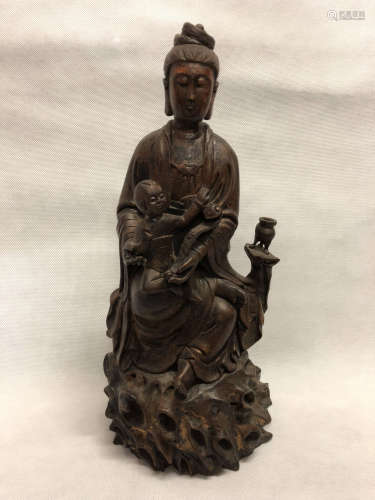 A QING DYNASTY WOOD GUAN YIN STATUE