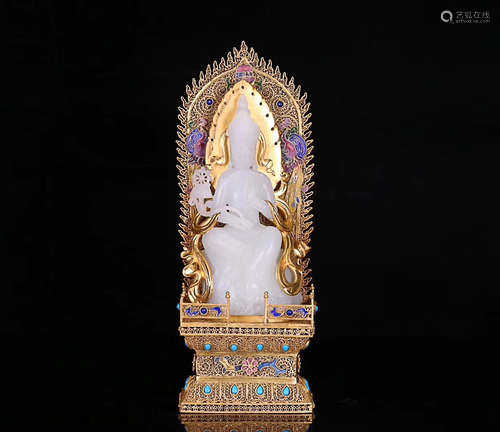 A HETIAN JADE GUANYIN STATUE WITH BRONZE GILT HOLDER