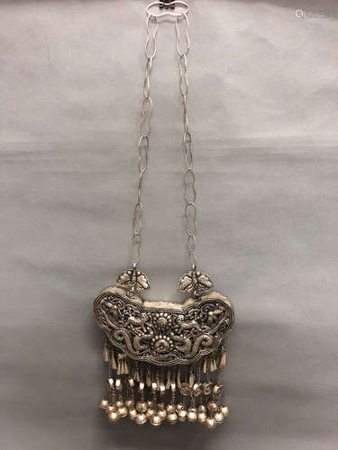 A MINORITY SILVER ORNAMENT, QING DYNASTY