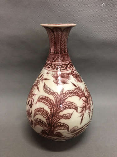 AN UNDERGLAZED RED OKHO SPRING BOTTLE, YUAN DYNASTY