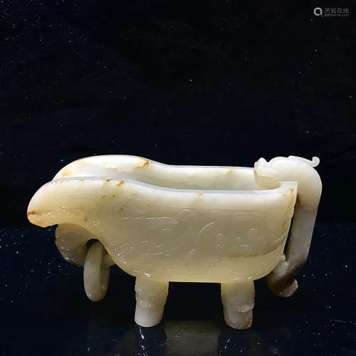 A QING DYNASTY HETIAN JADE FOUR FEET CUP