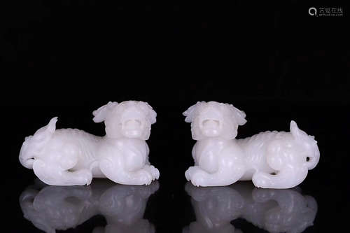 A PAIR OF HETIAN WHITE JADE ANIMAL  LATE QING