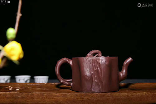 A RAW ORE PURPLE CLAY TEAPOT