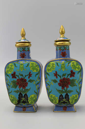 Pair of Chinese cloisonne vases with lids.