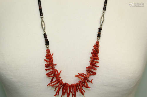 Coral and sterling beads necklace.