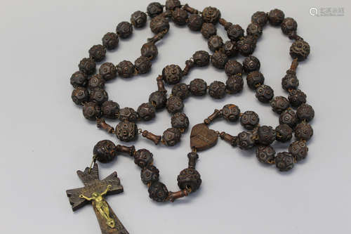 Rosary prayer's necklace with wood bead.