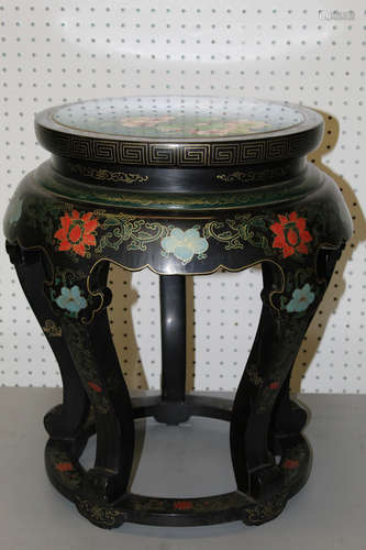 Chinese lacquered stool with cloisonne top.