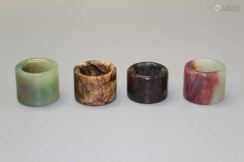 Four Chinese stone thumb rings.