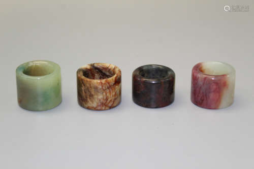Four Chinese stone thumb rings.