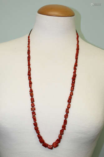 Red coral necklace.