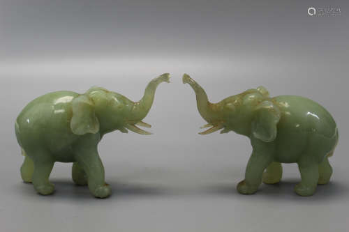 Two carved jade elephants.
