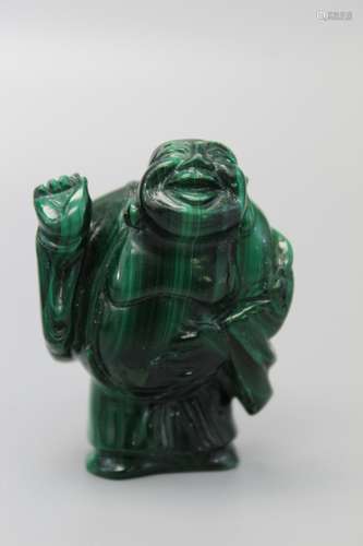 Japanese carved malachite netsuke of a laughing buddha.