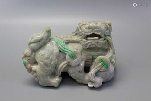 Chinese carved jadeite foo dog.