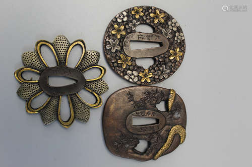 Three Japanese tsuba.