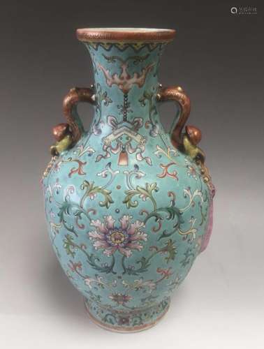 Qianlong Mark, A Green Ground and Famille Rose Vase