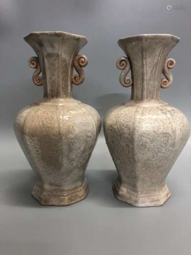 A Pair of White Glazed Vases