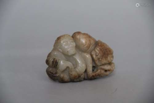 A Carved Jade Figure with Lion