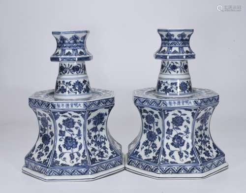 A Pair of Blue and White Candle Stand