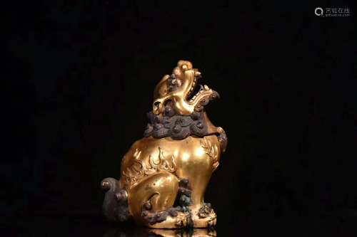 A Gilt Bronze Beast