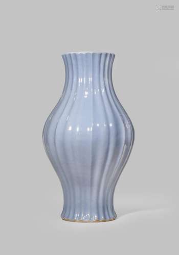 A CHINESE PALE BLUE-GROUND VASE